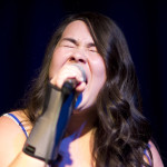 Mikaela Hurshman, junior, belts out a song during February's Camchella concert.