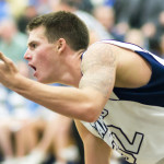Rhett King, senior, argues a foul with an opponent. Cam High's basketball team has been supported by this year's Cyclone, a group credited with raising the bar of behavior at sporting events.