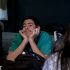 Micheal Griffin, senior, relaxing while drama discusses their next production.