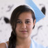 Kayla Colon, Senior, wears her graduation cap in one half of the picture, waiting for graduation and life after high school. Colon is a Stinger staff member.