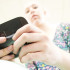 Kirsten Randall, senior, texts her mom as 6th period nears it end.