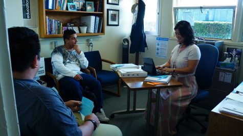 Kim Stephenson, associate principle, working with students.