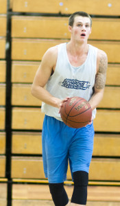 Rhett King, senior, handles the ball in preparation for a 3-point practice shot.