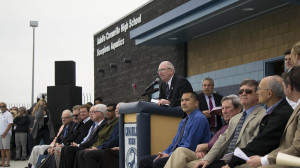 Principal Glenn Lipman conducts the opening ceremony of the pool. 