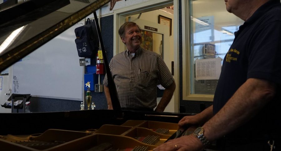 John Stava, spruces up Cam High's music department before his departure.