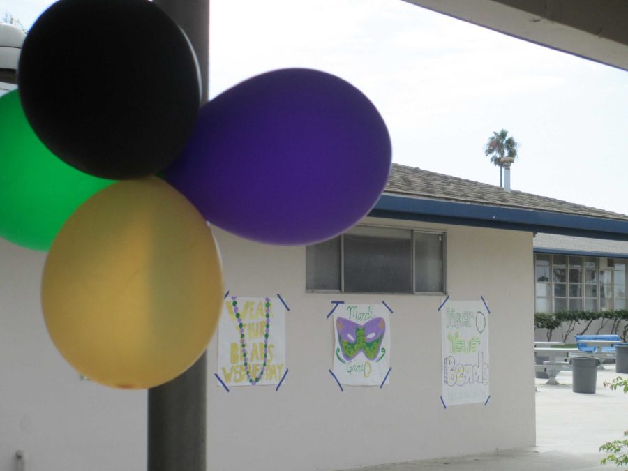 Cam High prepares for the approaching Mardi Gras Homecoming Dance by decorating Main Hall and a themed spirit week.