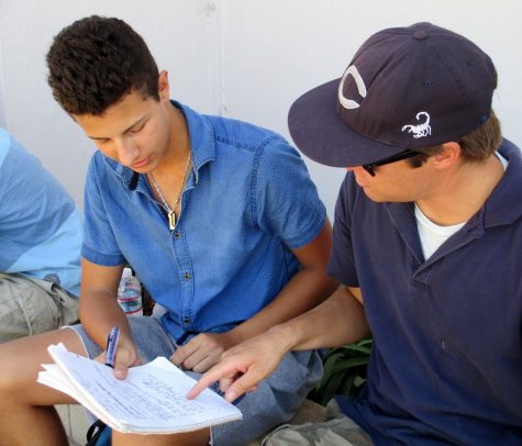 Joé Lamiri, French exchange student, works with his American History teacher, Mr. Chancer.