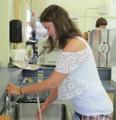 Julia Asch, Swiss exchange student, particularly enjoys her cooking class as part of her American school schedule.