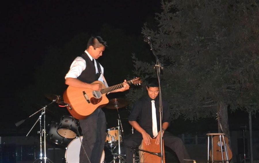 T. J. Jose (left) and Harrison Cho (right) perform at the Kiwins  benefit concert for Project Eliminate, donating the proceeds for fighting neonatal and maternal tetanus.