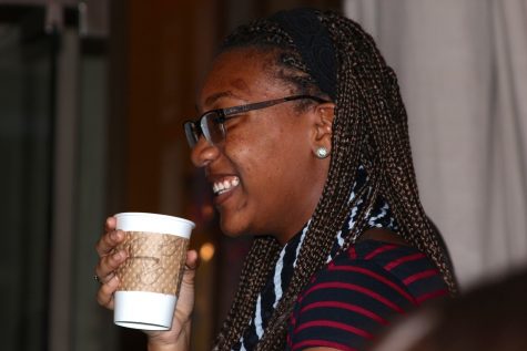 Students like Tiara Sivells (pictured above), junior, were invited to enjoy warm drinks and live entertainment in order to help raise funds for the EF tours.