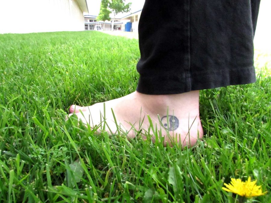 An anonymous student showcasing her tattoo.