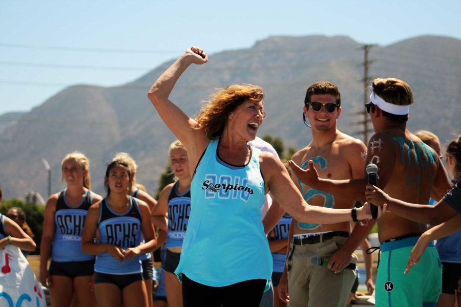 Ms. Lori Pristera, ASB director, rallies the crowd during the Welcome Back celebration in September.