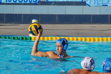 Senior Michael Rodriguez looks for a pass during the last home water polo game on Friday. Cam High beat Calabasas 7-3.