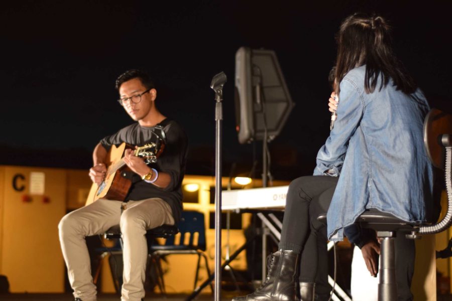 Joseph Cachin and Jalyne Santos, seniors, performing at the annual KIWINs Benefit Concert.