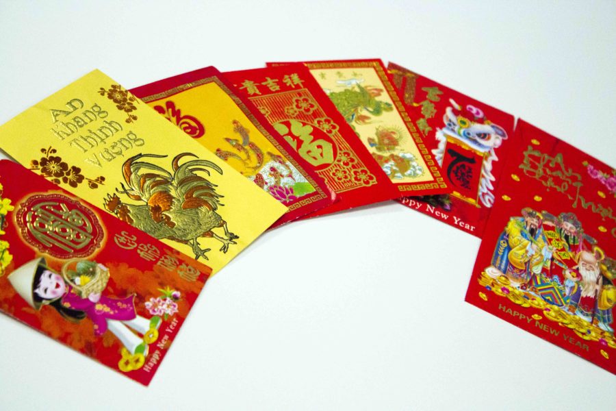 As+a+Chinese+New+Year+tradition%2C+grandparents+receive+red+envelopes+from+their+children+and+grandchildren+as+tokens+of+respect.