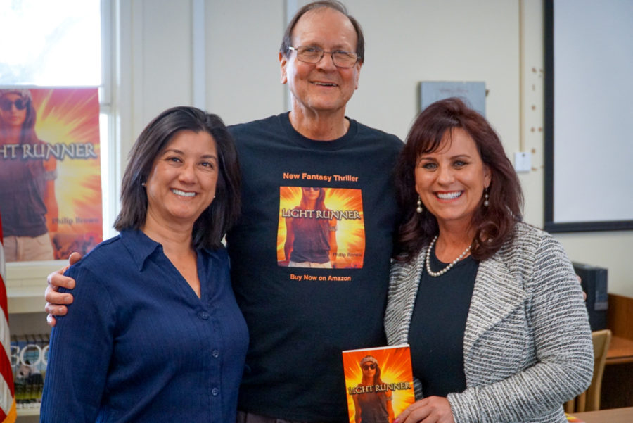 Author of Light Runner Mr. Philip Brown with teacher-librarian Miss Heidi Resnik and Principal Kim Stephenson.