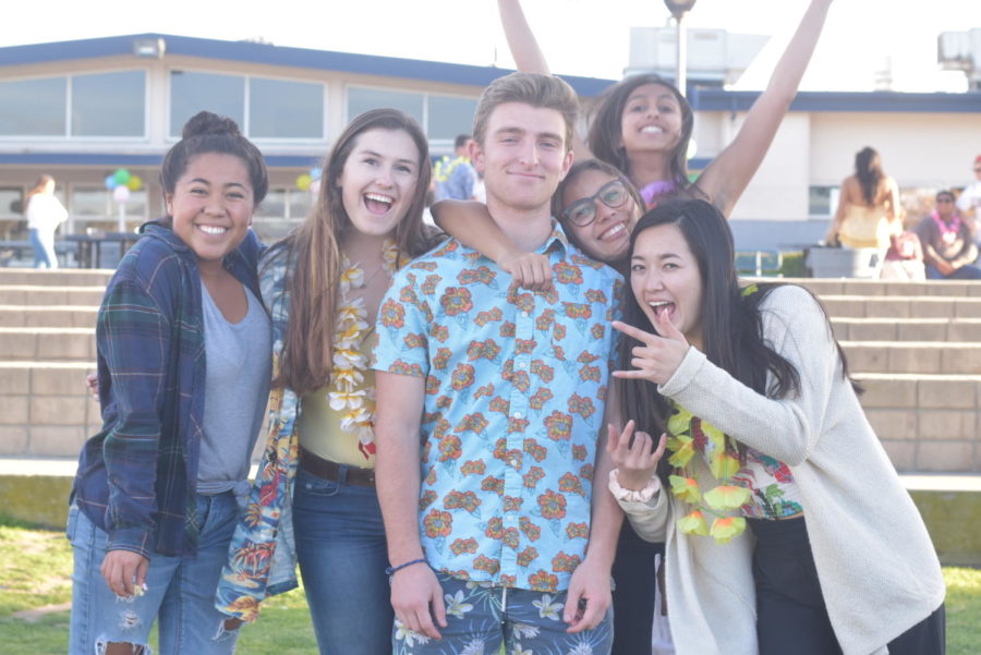 Seniors (from left to right) Caitlin Orozco, Mallorie Mehrali, Evan Grossman, Drew Reyes, Amy Raval, and Marissa Hiji at the luau. Photo by: Cecilia Bach-Nguyen
