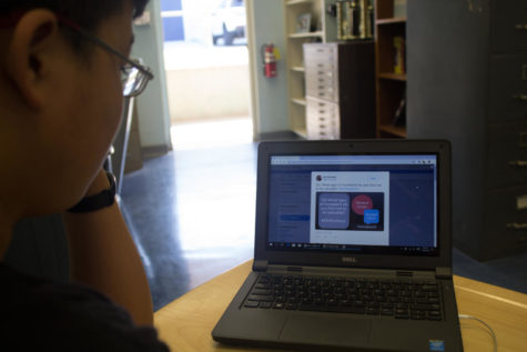 Staff Writer Edward Wang visits the #OUStuVoice Twitter page.
Photo by: Ian Lattimer