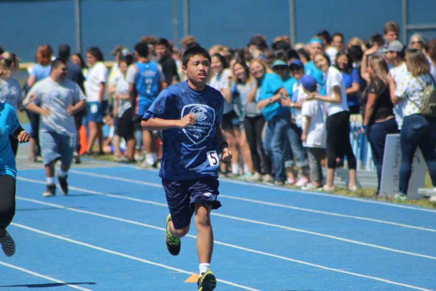 James Labsilica runs the 100 meter event at the Special Olympics Track Meet, on Friday, April 19, 2019.