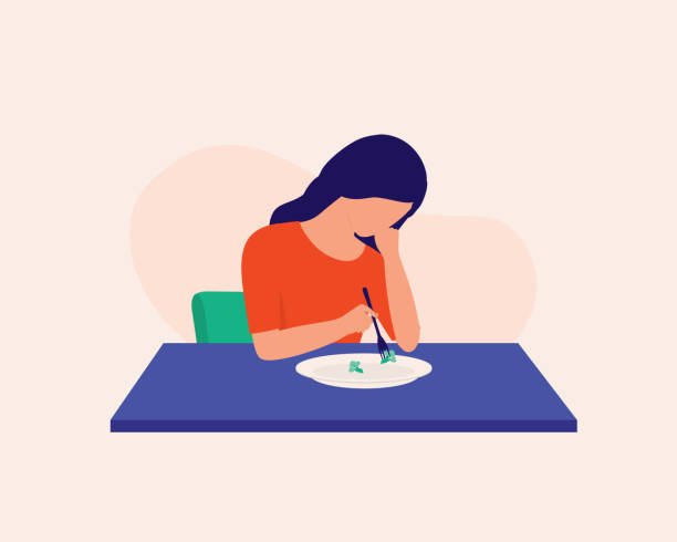 A young depressed woman is depicted with a fork and plate. She only eats a very small amount of food.